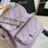 トレンド女性デザイナーバックパック紫色のハンドバッグ屋外旅行クロスボディショルダーバッグレザーダイヤモンド格子型バニティケースハンドバッグゴールドハードウェアクラッチポッシュ