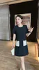 Little Black Robe 2024 Summer New Western Round Neck Office Worker A-Line Jirt Age Robe réductrice pour les femmes