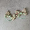 Accessoires de cheveux 2024 Printemps / été pastoral doux bébé et petite fille en cuir groupe rose vert vérifié à coffre à nœud arc