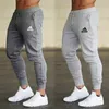 Joggers Pants for Men Summer Cultaling Pantaloni sottili Cousons Allenamento in palestra Fitness Sport Strumenti casual 240425