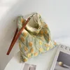 Neue chinesische Tasche strukturierter grauer Stoff Ein -Stück -Tasche unabhängiger hausgemachter Lederseil Schultergurt Design Handtasche