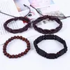 Заклинание браслеты 4pcs/Set Hippie Punk Macrame Clots Traph Brown Black Leather Wy Beads Слои Сложные обертывания