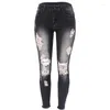 Jeans féminins 2024 Fashion Spring High Elastic-Longle-Longle Hole Pantalon de hanche serrée à pied
