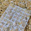 100pcs nail art zircon charmes aléatoires designs de luxe coréens bijoux de luxe pour la mode de décoration de nombreuses formes différentes pierres 240415