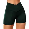 Short féminin Femmes High Stretch Taist Compression Sports avec des poches de téléphone pour l'exercice de gym yoga serré extensible