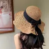 Chapeaux à bord large chapeau seau de seau d'été chapeau de soleil femme panama chapeau femmes Str chapeau grand brim de plage chapeau pliable vacances chapeau d'été