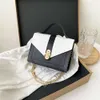 卸売女性ハンドバッグ安いデザイナー有名ブランド2023新しい夏のレディースショルダーバッグパールロック