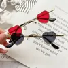Lunettes de lunettes extérieures Personnalité coeur Cadre PC Cadre Resin Lentes Small Glasses Alloy Sunglasses Mini For Men
