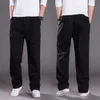 Spodnie męskie Spodnie ładunkowe Sprężyna i jesienna elastyczna talia rozciągnięte spodni swobodne spodnie luźne kieszenie męskie proste szerokie legsl2403