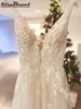Настоящее изображение глубокие v-образные рукавов A-Line Свадебные платья иллюзия бисероплетения кружевные свадебные платья