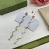 Luksusowe kolczyki projektant litera g urok kryształowy płótno kwiat krąże