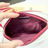 Designer merkpakket korting groothandel 2024 Nieuwe mode een schouder crossbody handtas veercamera tas mini cherry