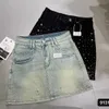 Jupe denim en strass étoilée pour les femmes Somment rétro après la gaine A-line 240424