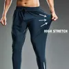 Pantalones para hombres de verano para hombres elásticos que corren lentos de entrenamiento al aire libre deportes de gimnasio Q240429