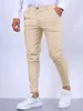 Męskie spodnie solidny kolor Modne męskie spodnie Europejskie i amerykańskie łydki angielskie Cielę przez cały sezon Wygodne swobodne Q240429