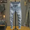 Jeans masculinos 2023 Primavera/verão Nova tendência da moda Sólida cor elástica elástica mensual Ultra Fin