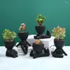 花瓶のクリエイティブブラックフィギュアホームテーブルテーブルテーブルトップの装飾植物サボテックポット抽象的な彫像植物