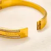 Nuovo classico braccialetto di lusso e orecchini set di gioielli set di gioielli in acciaio inossidabile 18K Gioielle