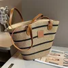 Wochenendstrohbeutel Einkaufstasche Große Handtasche Designer -Taschen Sommer Beach Bag große Kapazitätsbeutel Handtaschen Geldbeutel Lafite Gras Webe Leder Einkaufsreise -Reisetaschen