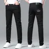 Весна 2023 г. Тонкие мужские джинсы корейские маленькие ноги Slim Fit Premium European Pure Black