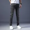 Light 2023 Luxury Grey Jeans Mens Fashion Brand European Slim Fit Small Feet Elastic Busin Pantalon décontracté polyvalent