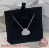 Elegante collana d'argento S925 adornata con fortunato trifoglio a quattro foglie