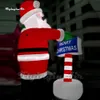 Partihandel Fantastisk röd jätte Uppblåsbar Santa Father Christmas Figure Model Luft upp Saint Nicholas som håller ett skylt för Xmas utomhusdekoration