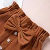 Skirts Spring ldren Baby Girls Skirts 0-4Y Cute Sweet Bow Button A-Line Skirts Autumn Girls Solid Fashion Clothing H240509