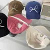Chapeaux de caps coréens Instagrams Nouveaux chapeaux de protection solaire doux et mignonne Chatte de langue de canard conçu pour les femmes printemps / été avec le même archeur de baseball CAPL240429