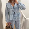 Kvinnors blusar kvinnor grundläggande slips främre toppar avslappnad fast färg doll krage lång ärmskjorta estetiska kläder chic koreanska blus streetwear