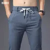 Pantaloni maschili kubro 2023 da uomo estate casual seta di seta dritta dritta alta disegno elastico nuovo affare di moda autunno pantaloni blu q240429