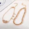 Europese en Amerikaanse 18K GOUD GOLD CREATIEVE PERSOONLIJKE PERIALISCHE STRAND ANKLET RETRO BUTLET ANKLET Vrouwelijke grensoverschrijdende punkketen Anklet 2-delige set