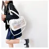 Bolsa de bebê Bolsa coreana Bolsa de dor japonesa Bar transparente PU PU MOLA MENINA BACA DE ombro de estudante Bolsa quadrada de anime Messenger Bag