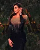 Czarny seksowny vintage z ramienia długie rękawy wieczorne sukienki z koralikami cekinowo -syrenki suknie balowe 2024 najnowsze