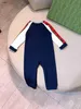 Populära nyfödda jumpsuits Multi Color Splicing Design Toddler Kläder STORLEK 52-90 CM Baby Crawling Suit Långärmad spädbarn Bodysuit 24April