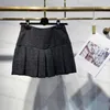 Luksusowy projektantka damska dwuczęściowa sukienka spódnica wiosna/lato nowy francuski minimalistyczny styl stały kolor piersi kamizelka w dekolcie plisowana z wysokim talią krótką spódnicę