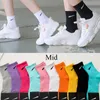 Herrstrumpor för män Kvinnliga Sock Designer Socks Cotton Solid Color Socks Tisters Classic Black White Football Basketball Sport Stocking Luxury Sportsocks