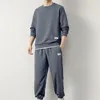 Parcours masculins 2pcs / ensembles hommes Casual Sport Costume Texture Waffle O-cou de survêtement