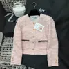 Diseñadora Chaqueta para mujeres Spring and Summer Nuevo celebridad Little Viento fragante Pequeño multitud de cuello de pecho sólido abrigo corto de manga larga