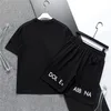 Designer Sports Set Brand Design New Men's T-shirt Summer Cotton Pure Casual Loose Round Neck Pullover Imprimé noir et blanc Lettre de luxe Jacket Shorts M-3XL