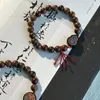 Strand huanghua pulsera de pera buda placa de cuentas macho y femenina china cultural juguetón león despertar madera de madera