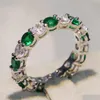 Anéis de casamento Jóias de luxo da marca brilhante 925 Sterling Sier Round Cut Emerald Zirconia Women Band Circle Ring Drop Drop Deliver