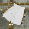 Luxe baby tracksuits zomer zonnebrandcrème voor kinderen designer kleding maat 100-160 cm checker splicing ontwerp kap jas en shorts 24april
