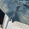 Diseñadores de moda Jeans para mujeres Temprano en la primavera NUEVA ACADEMY Estilo de academia Doble de moda Doble de bolsillo Alta Cotiza pura Micro elástica Jeans cortas