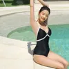 Menas de banho feminina Black Swimsuit One Piece Women 2024 Sports Swimming Swimming para tomar banho Summer Beachwear Bather Monokiny Swim