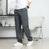 Pantaloni da uomo pantaloni da carico di grandi dimensioni pantaloni per gamba dritta uomini sciolti in forma larga in generale laterale maschio multi tasca