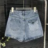 Shorts Femmes Jeans Summer PPRA BROIDED LETRON CONCEPTION Back Pocket Metal Triangle Logo Modèle décoratif Denim Shorts Womens High Waist High Quality