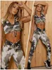 Traccettaci da donna Gymdolphins 2024 Summer New Womens camuflage Sports Set canotta a V-Neck Top e Lace-up High Wely Skinny Leggings Stupt fitness Y240426