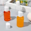 Lagringsflaskor 20 st qianqiu cap flask sub för emulsion lotion containrar resor smink makeup dispensers pet