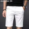 Short masculin blanc déchiré des hommes grattés de jean d'été décontracté élastique plus taille 36 38 40 42 Black Boys trous mi-pantalon